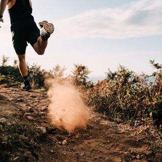 A man trail running on Jersey