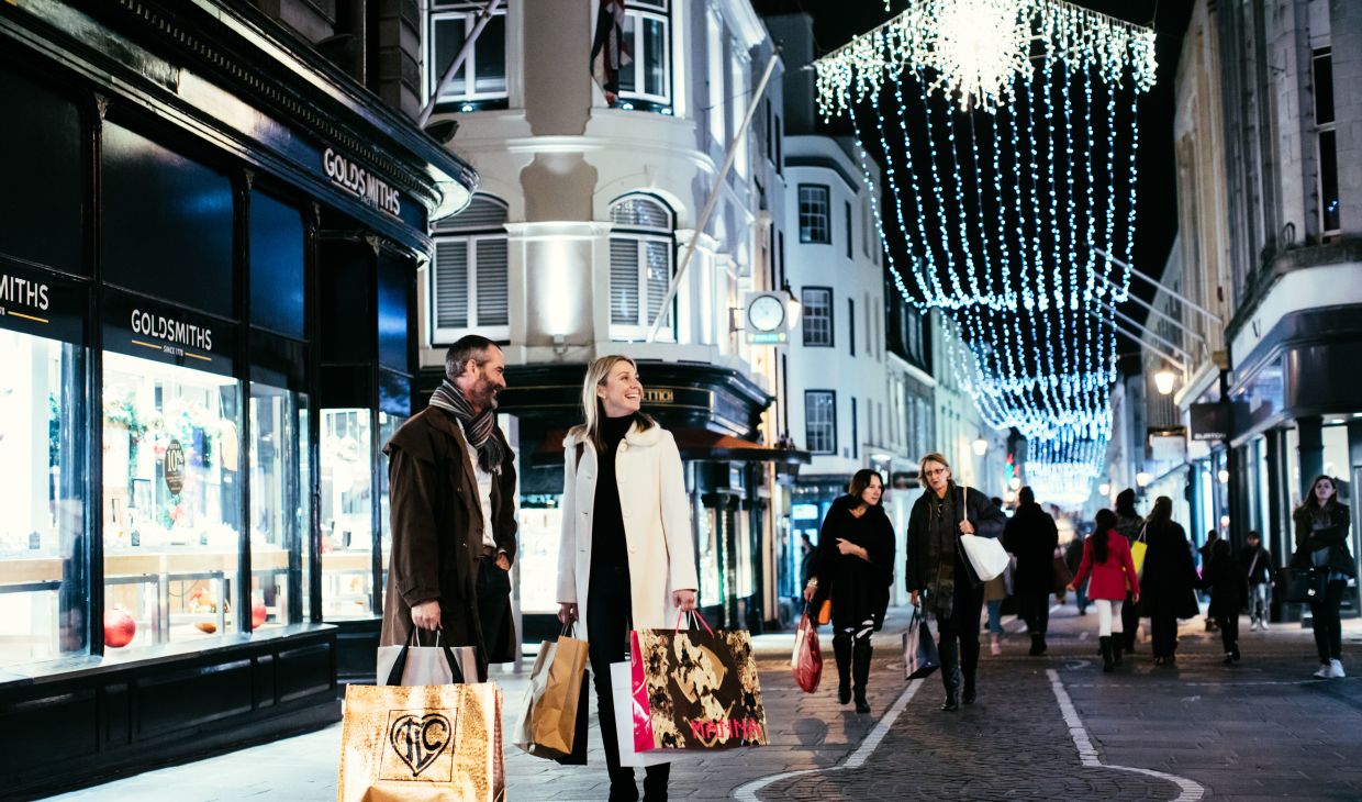 A couple shopping for Christmas in Jersey, St Helier.